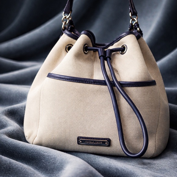 Coach Handbags - Coach Cream and Navy Blue Drawstring Shoulder Bag